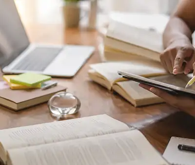 Person at a desk doing title research